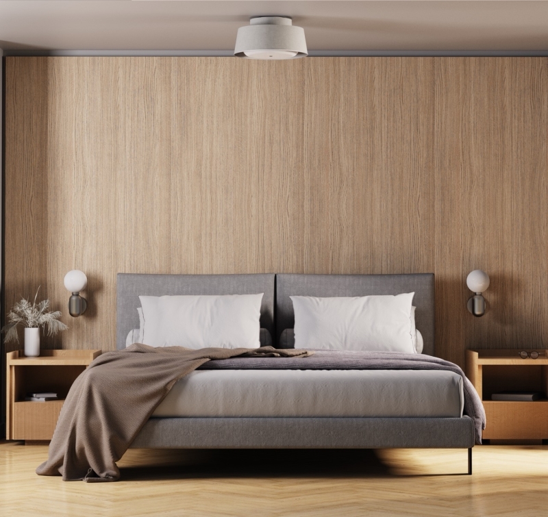 Modern ingerichte slaapkamer met slimme plafondlamp van Nobi thuis, combineert stijl en valdetectie voor veilige nachtrust bij ouderen.